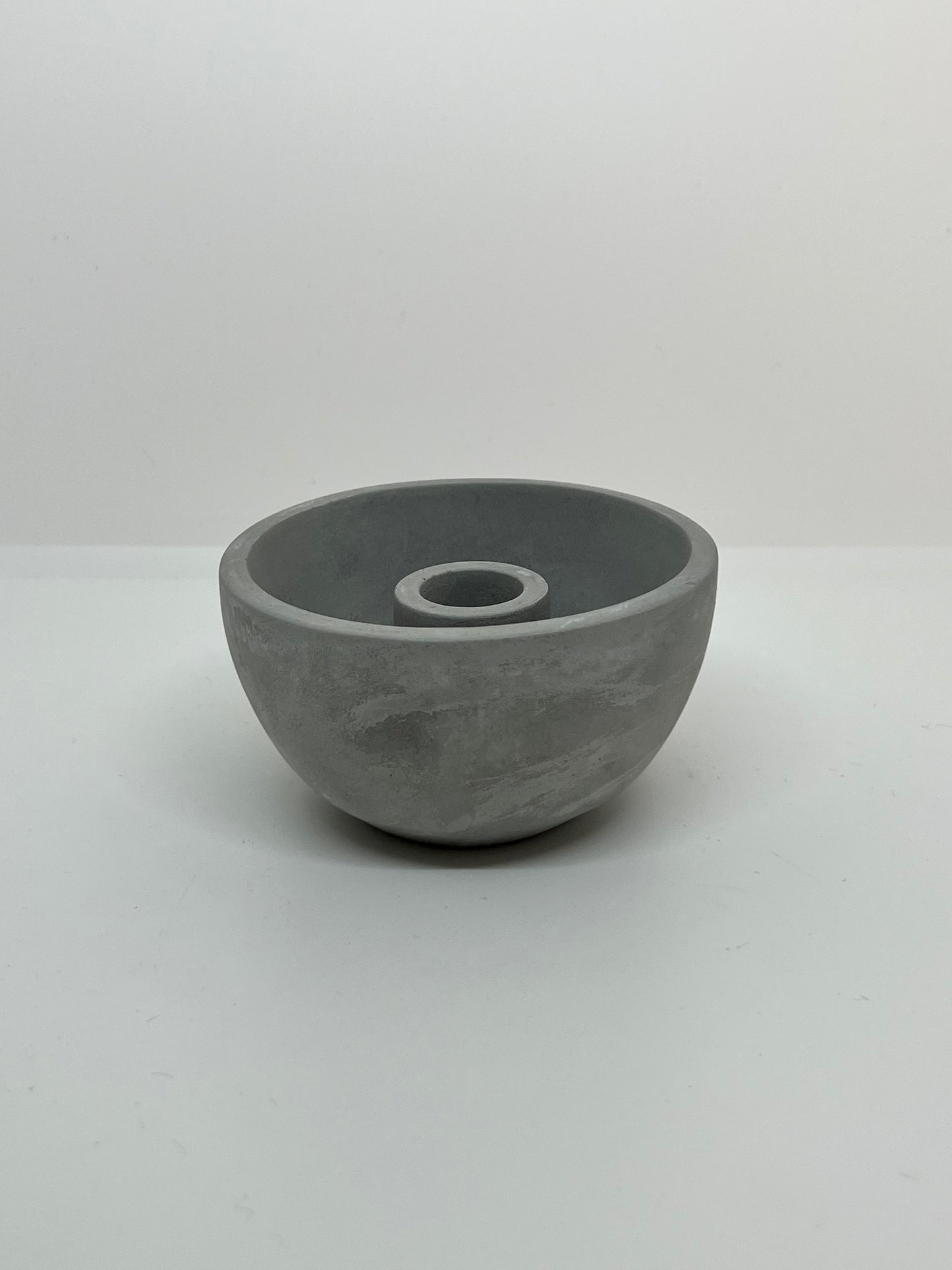 Concrete solo candle holder