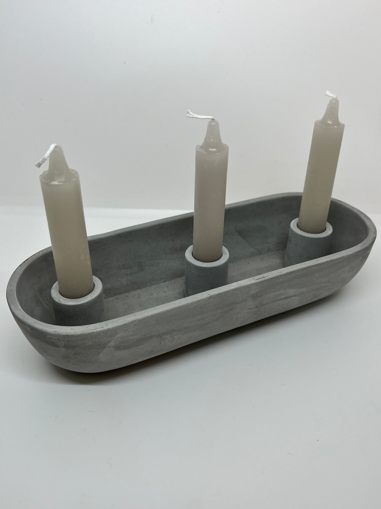 Concrete triple candle holder