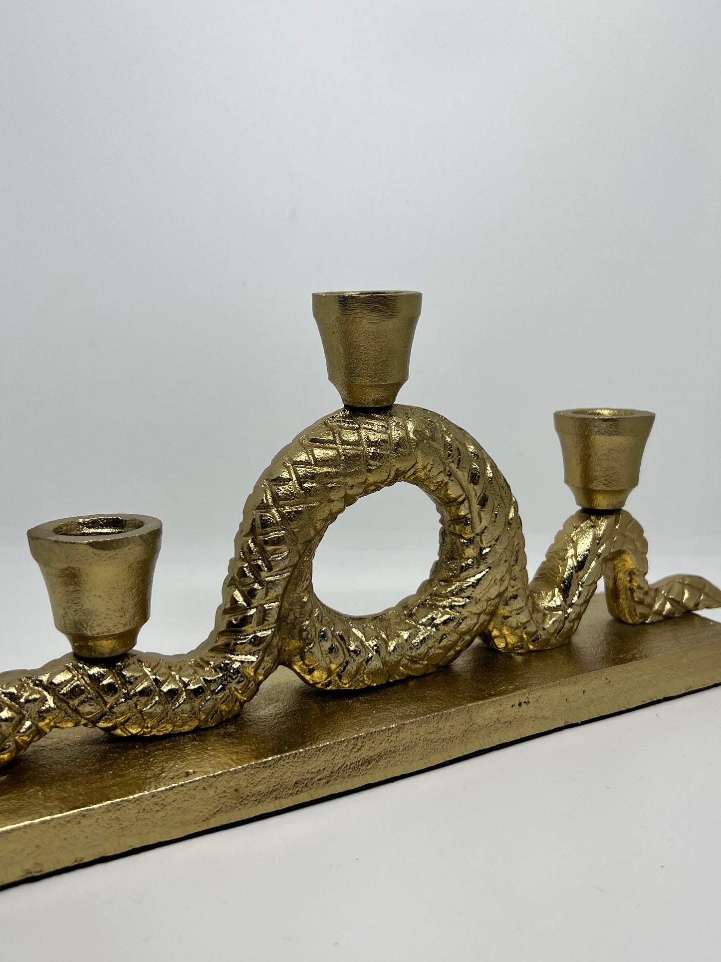 Snakes everywhere candle holder gold