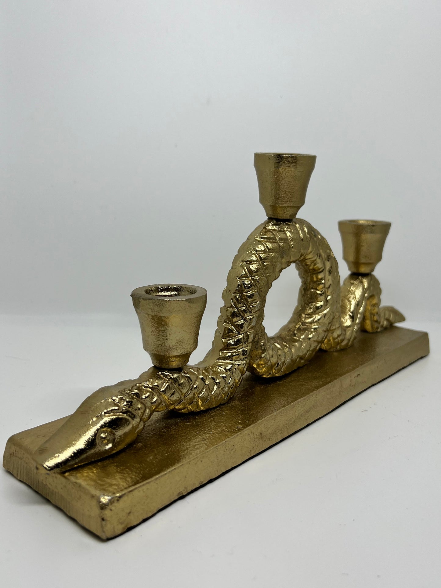 Snakes everywhere candle holder gold